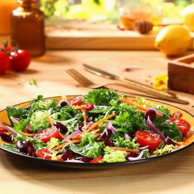 Salad with red beans, cherry tomatoes and honey dressing