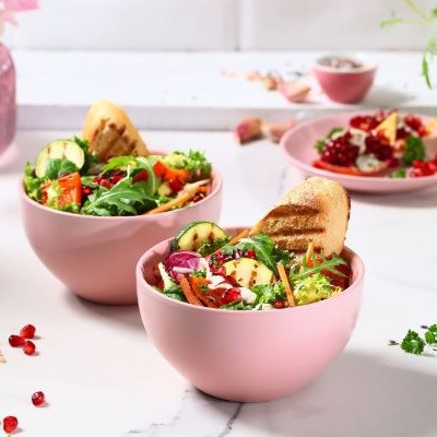 Salad with grilled zucchini, peppers and pomegranate seeds