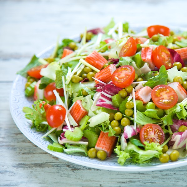 Salad with peas and surimi